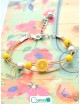 Pulseras con dijes de porcelana
