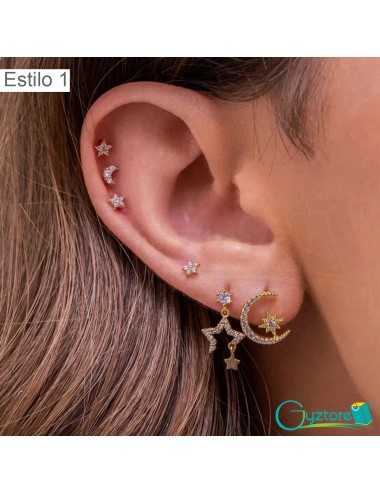 Set de aretes dorados...